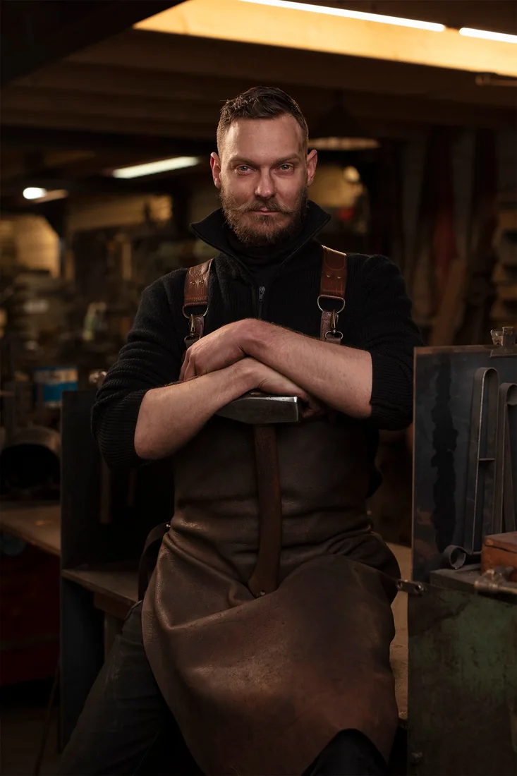 Justus in de werkplaats van Artisans.